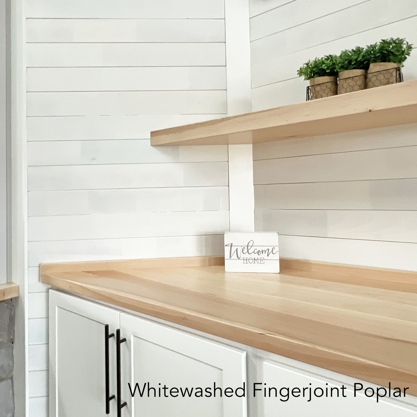 White shiplap wood accent wall